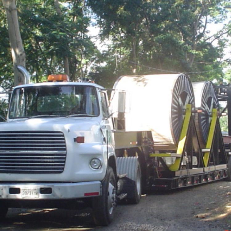 Electrical cable on spools on a flatbed